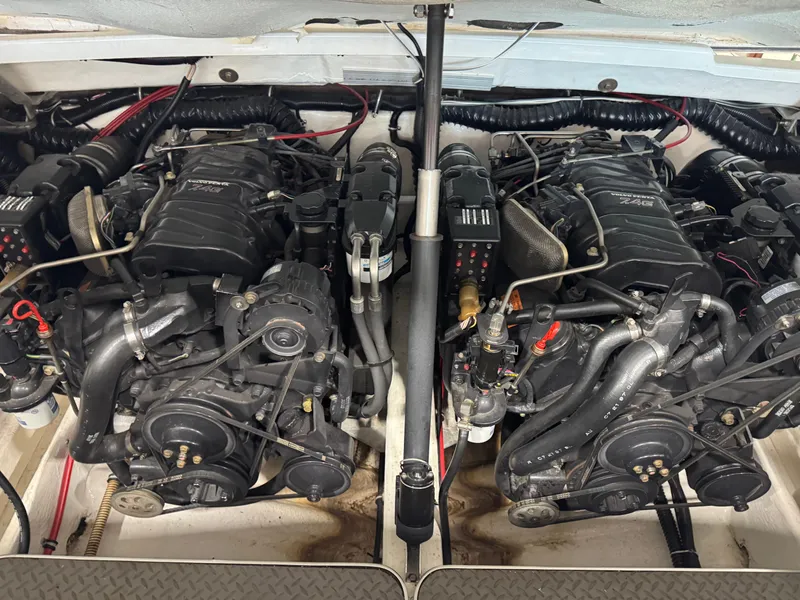 Slide: The Image of Twin engines in a 1998 Formula 330 SS boat, showcasing detailed mechanical components. - 15