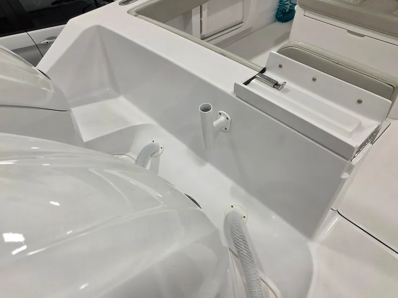 Slide: The Image of 2023 Jupiter 30 boat interior, featuring sleek white design and modern fittings. - 19
