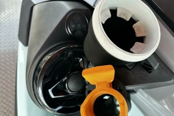 Slide: The Image of Close-up of 2022 Sea-Doo Wake Pro 230 dashboard with cup holder and speaker. - 13