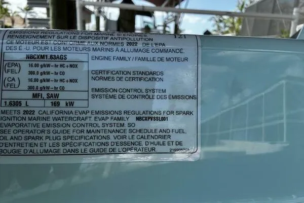 Slide: The Image of 2022 Sea-Doo Wake Pro 230 emission label detailing engine specifications and certification standards. - 17