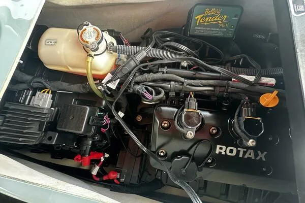 Slide: The Image of Engine compartment of a 2022 Sea-Doo Wake Pro 230 with Rotax engine components. - 7