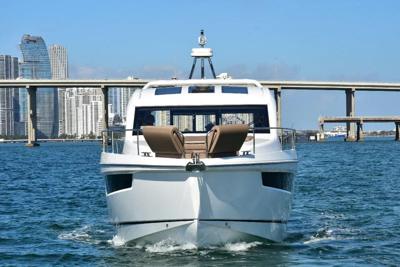 Slide: The Image of 2022 Sealine C430 yacht cruising near city skyline and bridge. - 28