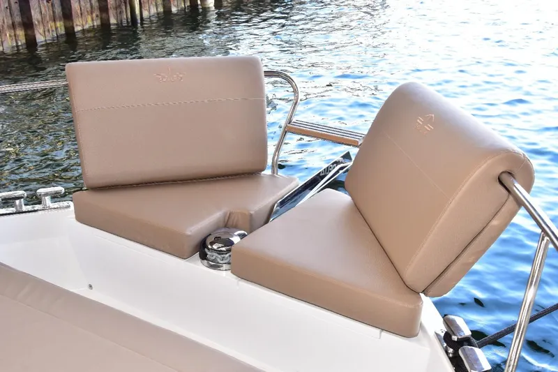 Slide: The Image of Luxury seating on 2022 Sealine C430 yacht, overlooking serene water. - 47