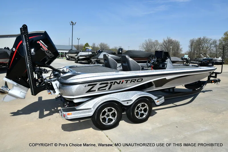Slide: The Image of 2020 Nitro Z21 Pro boat with trailer, parked outdoors on a sunny day. - 18