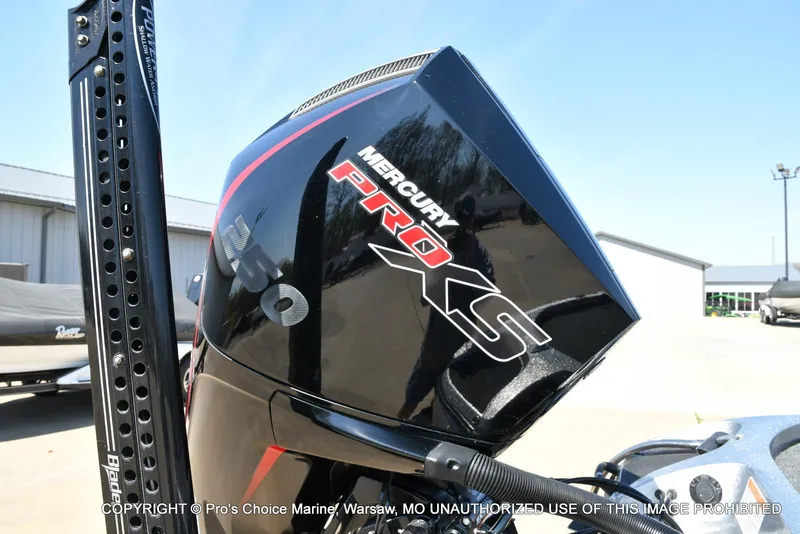 Slide: The Image of 2020 Nitro Z21 Pro with Mercury Pro XS engine in a marina setting. - 20