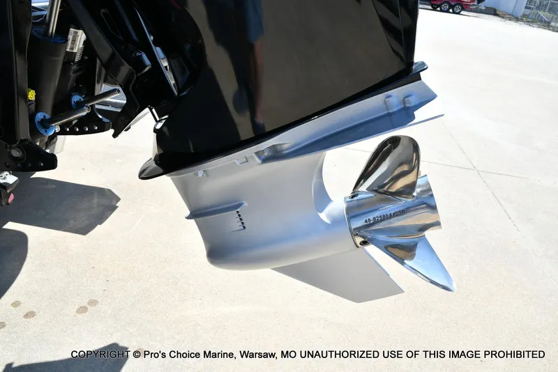 Slide: The Image of 2020 Nitro Z21 Pro boat propeller and lower unit on concrete surface. - 24