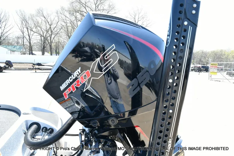 Slide: The Image of Mercury Pro XS 250 engine on a 2020 Nitro Z21 Pro boat, outdoor setting. - 25