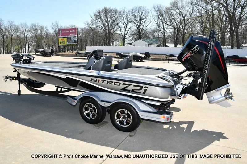 Slide: The Image of 2020 Nitro Z21 Pro boat with trailer, parked outdoors on a sunny day. - 26