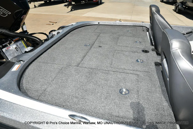Slide: The Image of 2020 Nitro Z21 Pro boat deck with gray carpet and seating. - 38