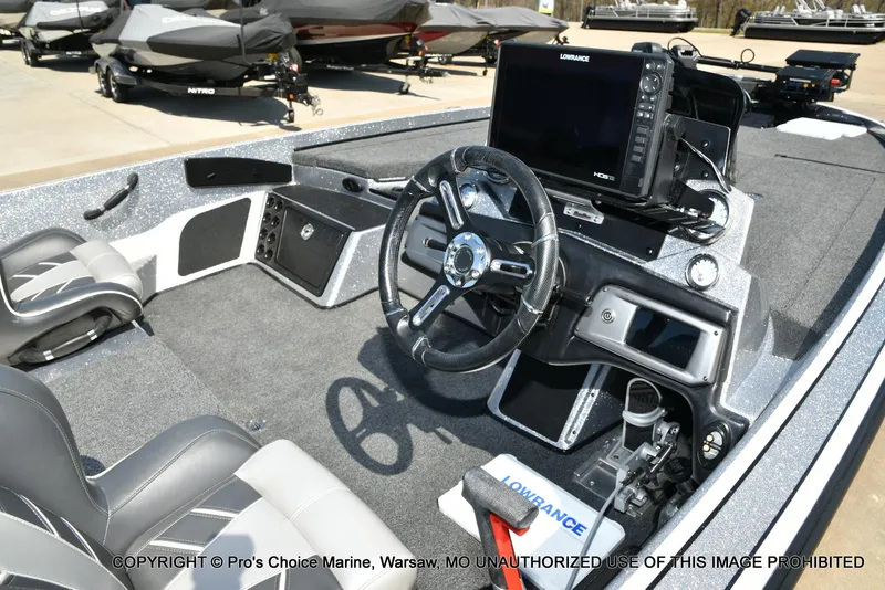 Slide: The Image of 2020 Nitro Z21 Pro boat interior with steering wheel and Lowrance electronics. - 39