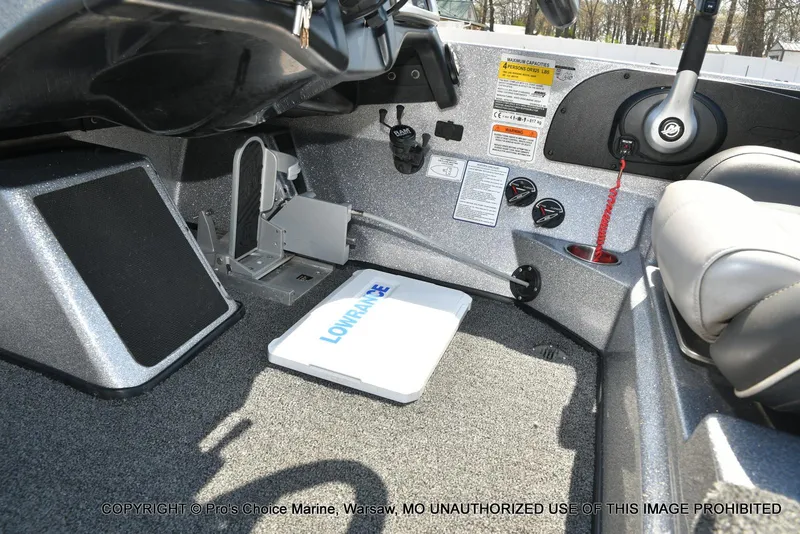Slide: The Image of Interior of a 2020 Nitro Z21 Pro boat with Lowrance equipment and control panel. - 47