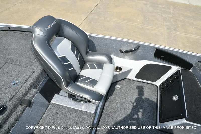 Slide: The Image of 2020 Nitro Z21 Pro boat seat with sleek gray and black design. - 48