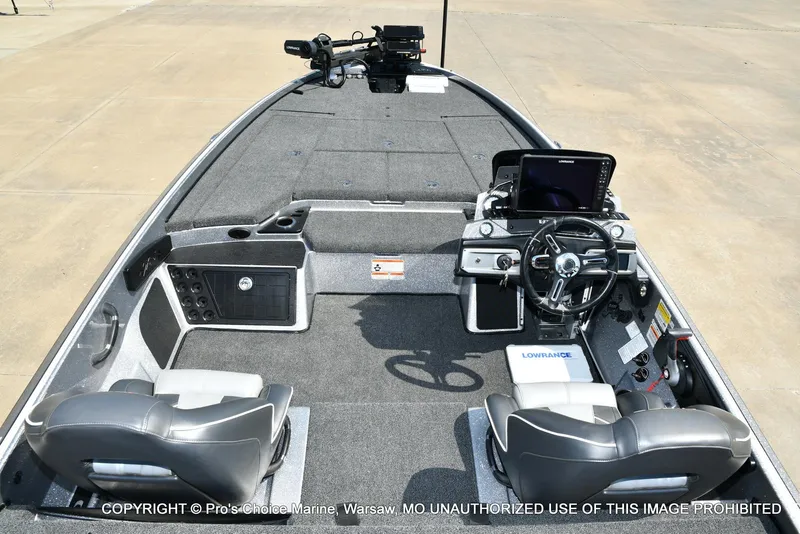Slide: The Image of 2020 Nitro Z21 Pro boat interior with steering console and seating. - 7