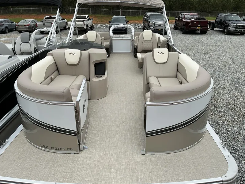 Slide: The Image of 2025 Avalon LSZ 23 Quad Lounger pontoon boat with spacious seating and modern design. - 15