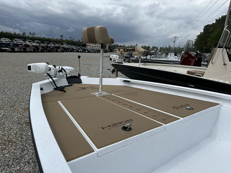 Slide: The Image of 2025 Xpress Hyper-Lift Bay Series 210 BAY-175 HP boat, featuring a spacious deck and modern design. - 9