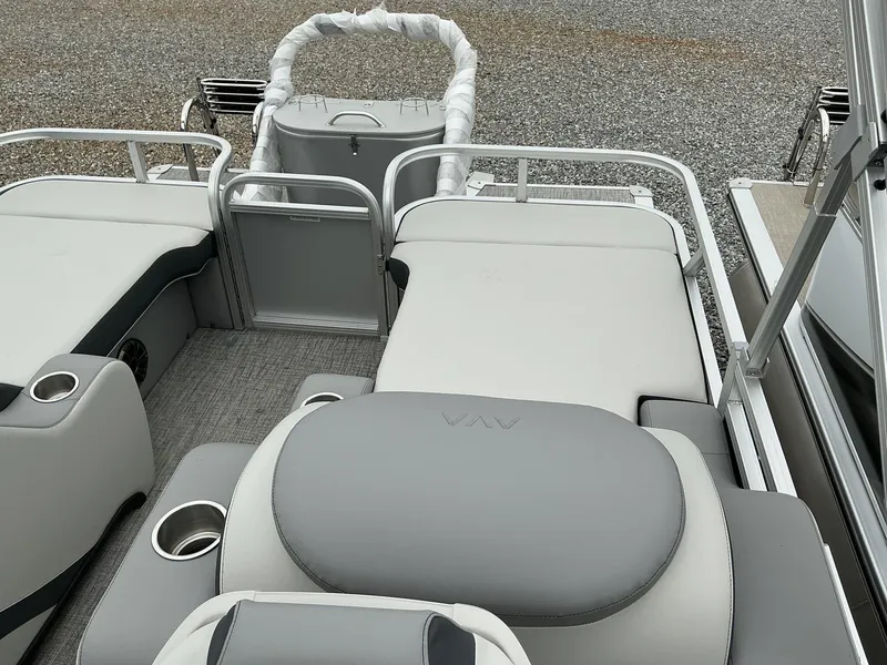 Slide: The Image of 2025 Avalon LSZ 23 Rear Lounger pontoon boat with spacious seating and cup holders. - 10