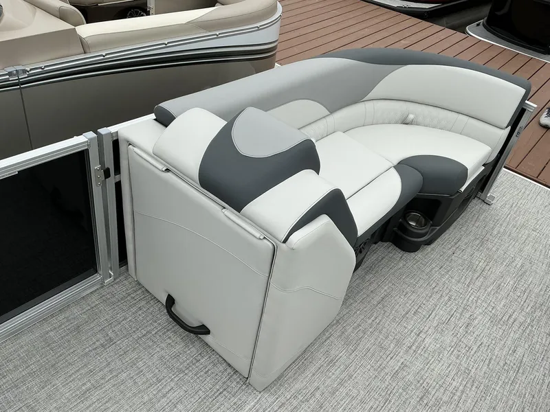 Slide: The Image of 2025 Avalon LSZ 23 Rear Lounger with sleek, modern seating design on a boat deck. - 14