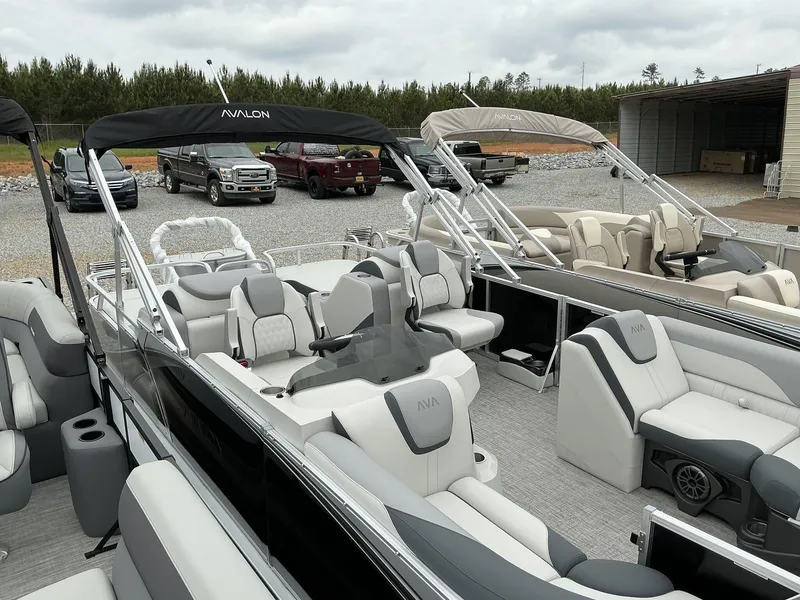 Slide: The Image of 2025 Avalon LSZ 23 Rear Lounger pontoon boat with luxurious seating and sleek design. - 3