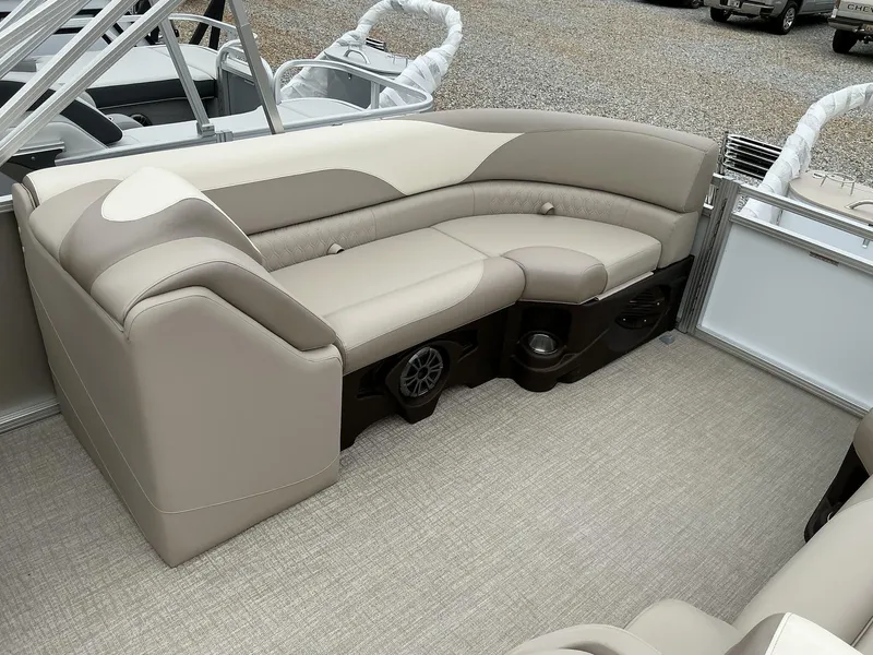 Slide: The Image of 2025 Avalon LSZ 23 Quad Lounger interior with beige seating and modern design. - 9