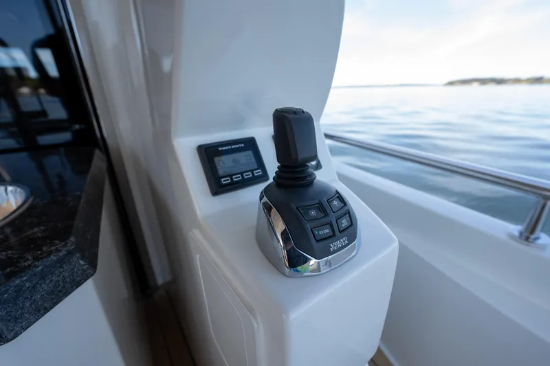 Slide: The Image of Control panel of 2018 Ocean Alexander 70E Motoryacht with joystick and display. - 17