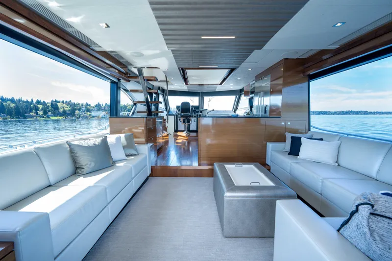 Slide: The Image of Luxurious interior of 2018 Ocean Alexander 70E Motoryacht with elegant seating and panoramic views. - 18