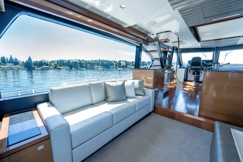 Slide: The Image of Luxurious interior of 2018 Ocean Alexander 70E Motoryacht with scenic water views. - 19