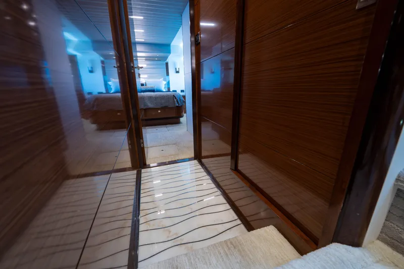 Slide: The Image of Luxurious interior of 2018 Ocean Alexander 70E Motoryacht, featuring polished wood and elegant design. - 27