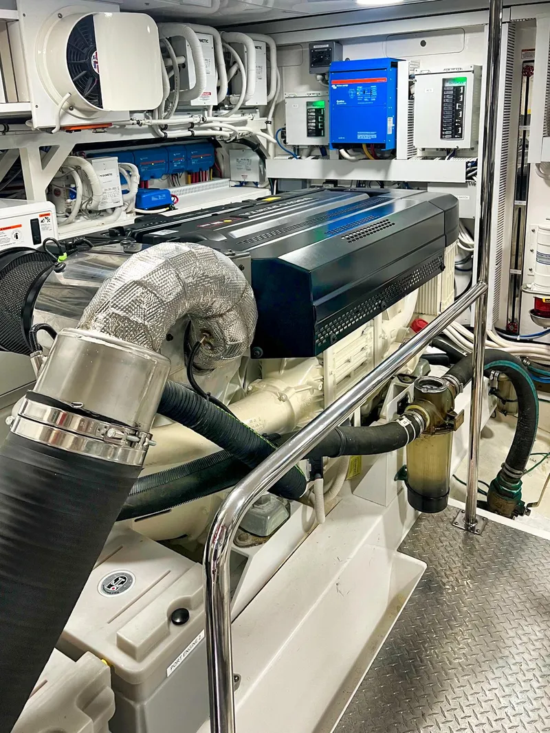 Slide: The Image of Engine room of 2018 Ocean Alexander 70E Motoryacht, showcasing advanced machinery and equipment. - 53