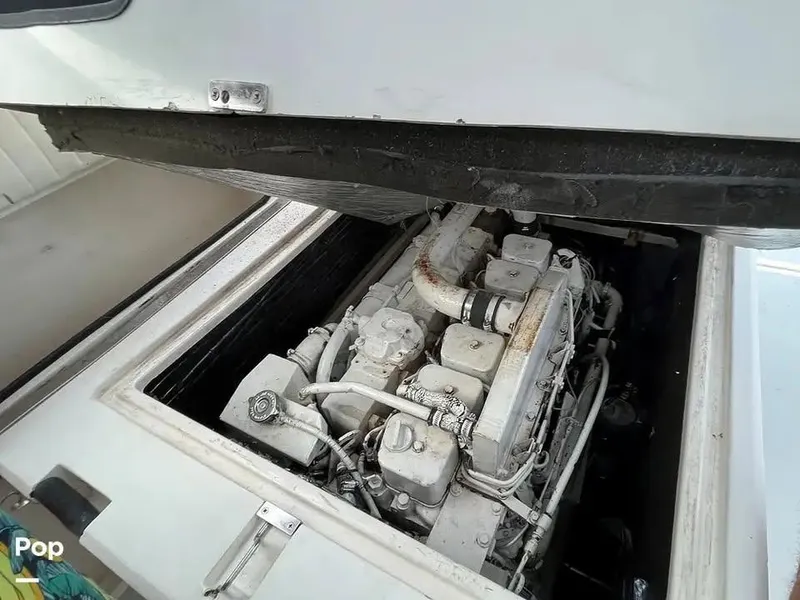 Slide: The Image of Engine compartment of 1988 Black Watch 30 Sportfish Convertible boat. - 7