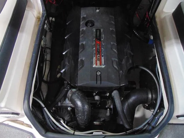 Slide: The Image of 2020 Yamaha AR195 engine compartment showcasing powerful marine engine components. - 11