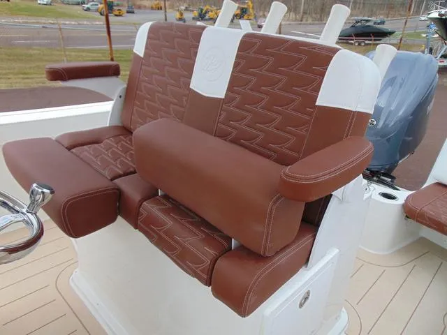 Slide: The Image of Brown and white seating on 2025 Parker 2400 Center Console boat. - 25