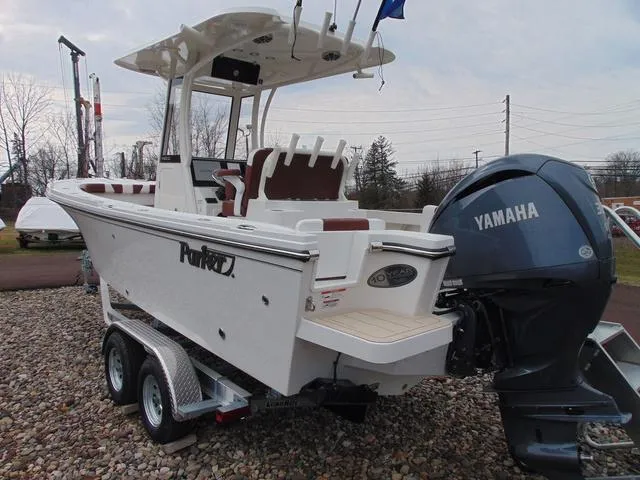 Slide: The Image of 2025 Parker 2400 Center Console boat with Yamaha engine on a trailer. - 5