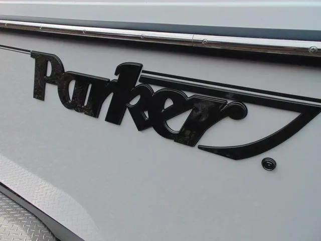Slide: The Image of 2025 Parker 2400 Center Console boat logo on white hull. - 6