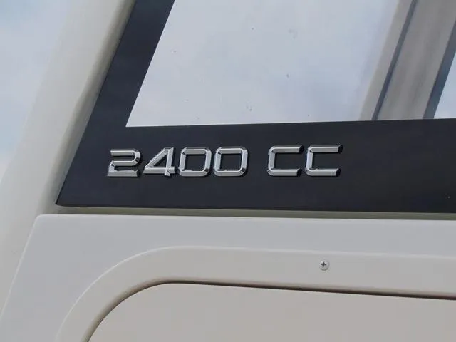 Slide: The Image of 2025 Parker 2400 Center Console boat emblem on window frame. - 7