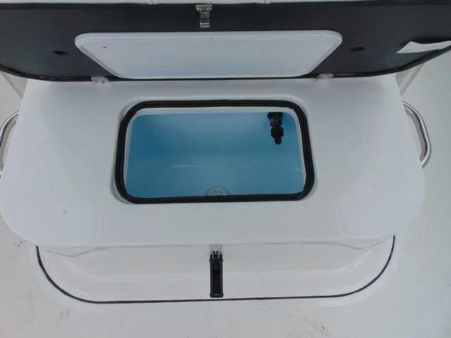 Slide: The Image of Livewell compartment in 2025 Parker 21SE Center Console boat. - 11