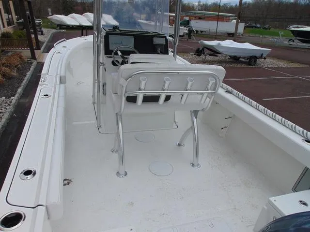 Slide: The Image of 2025 Parker 21SE Center Console boat with sleek white interior and modern controls. - 5