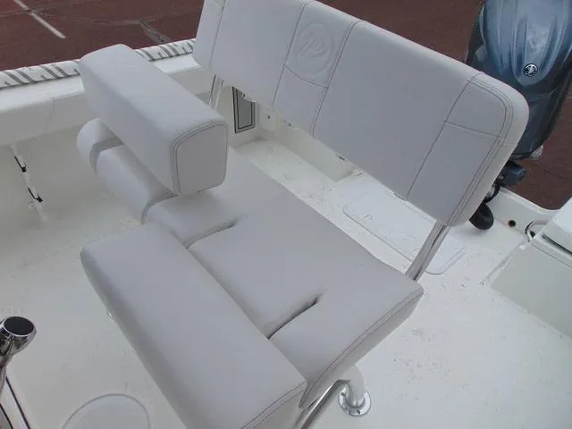 Slide: The Image of 2025 Parker 21SE Center Console boat seat, white upholstery, modern design. - 7