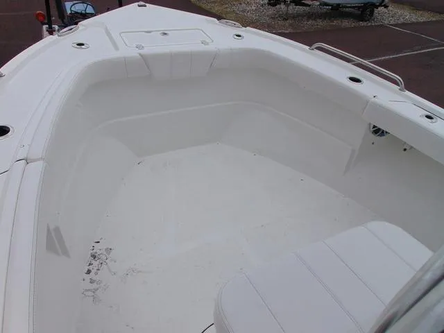 Slide: The Image of 2025 Parker 21SE Center Console boat interior, featuring spacious seating and clean design. - 9