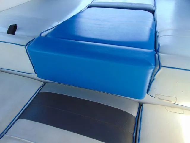 Slide: The Image of Blue and white seating on 1990 Sea Ray 260 Overnighter boat. - 10