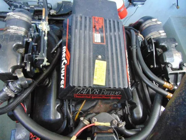 Slide: The Image of Engine of a 1990 Sea Ray 260 Overnighter boat, featuring MerCruiser 7.4L V8. - 29