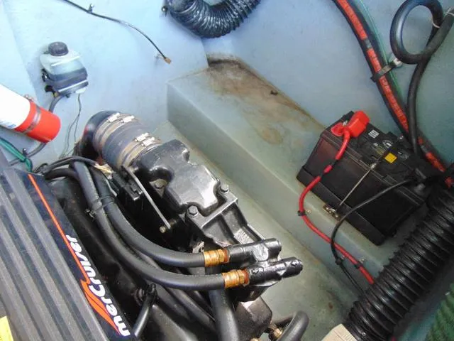 Slide: The Image of Engine compartment of 1990 Sea Ray 260 Overnighter with MerCruiser engine and battery. - 31