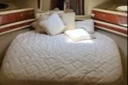Slide: The Image of Luxurious bedroom interior of 2004 Sea Ray 480 Sedan Bridge yacht. - 40