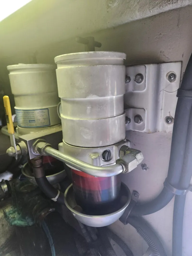 Slide: The Image of Fuel filter system in a 2004 Sea Ray 480 Sedan Bridge yacht engine room. - 47