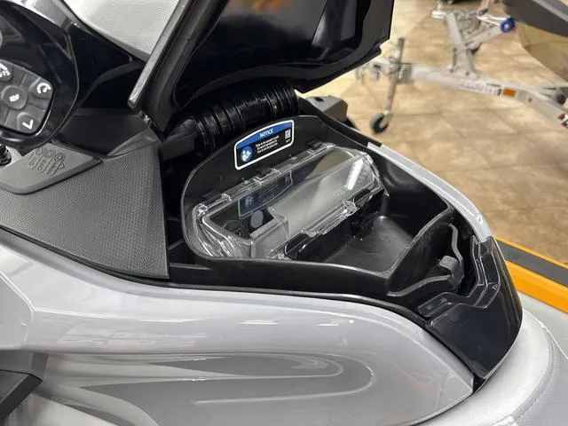 Slide: The Image of 2025 Sea-Doo Waverunner FISH PRO storage compartment, open and empty, showcasing interior design. - 13