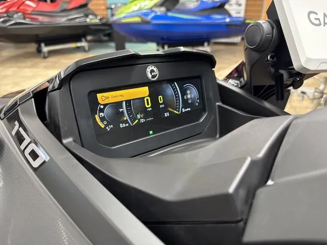 Slide: The Image of 2025 Sea-Doo Waverunner FISH PRO dashboard display with digital gauges and controls. - 9