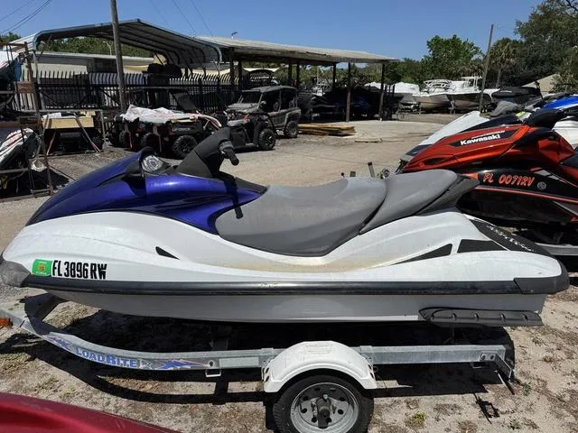Slide: The Image of 2004 Yamaha WaveRunner FX jet ski on trailer in outdoor storage area. - 3