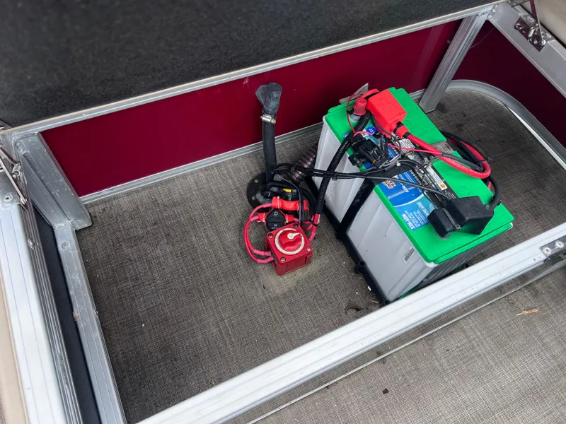 Slide: The Image of Battery compartment of 2022 Sun Tracker Party Barge 22 RF XP3 pontoon boat. - 22