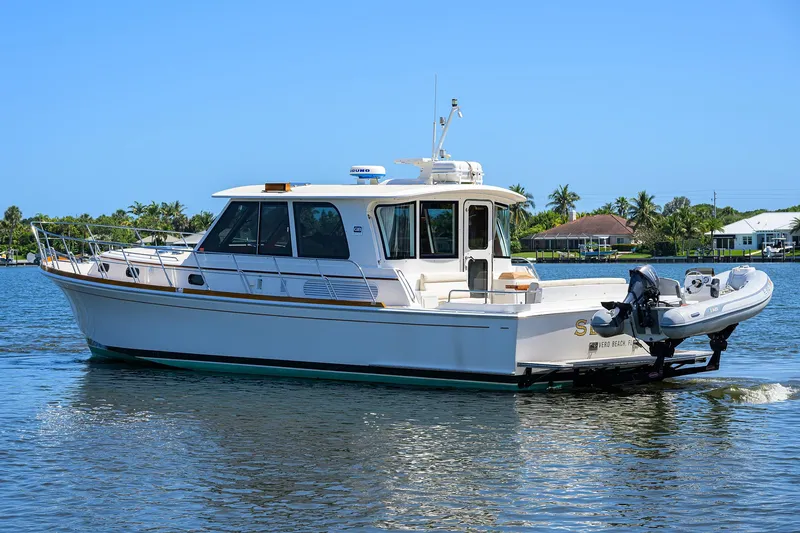 Slide: The Image of 2014 Grand Banks 46 Eastbay SX yacht cruising on a sunny day. - 10