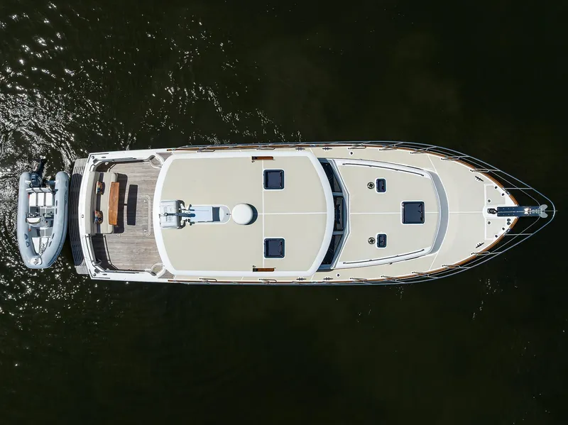 Slide: The Image of Aerial view of 2014 Grand Banks 46 Eastbay SX yacht on water. - 21