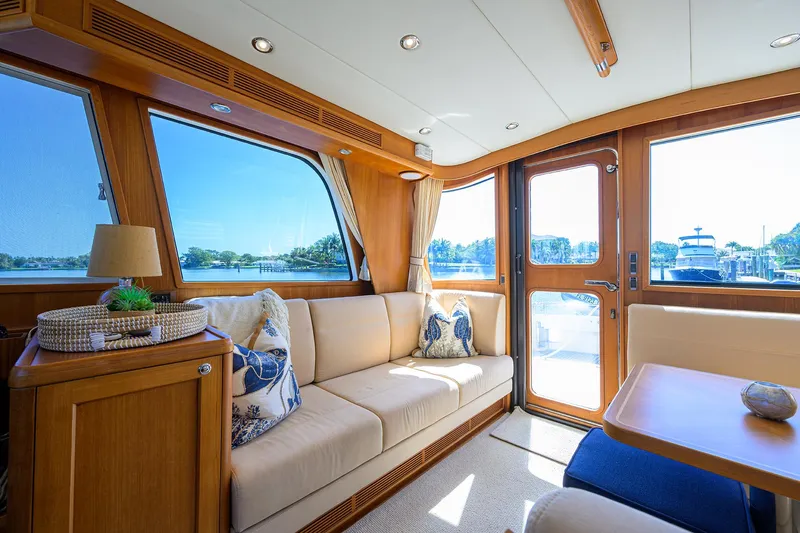 Slide: The Image of Luxurious interior of 2014 Grand Banks 46 Eastbay SX yacht with elegant seating and scenic views. - 41